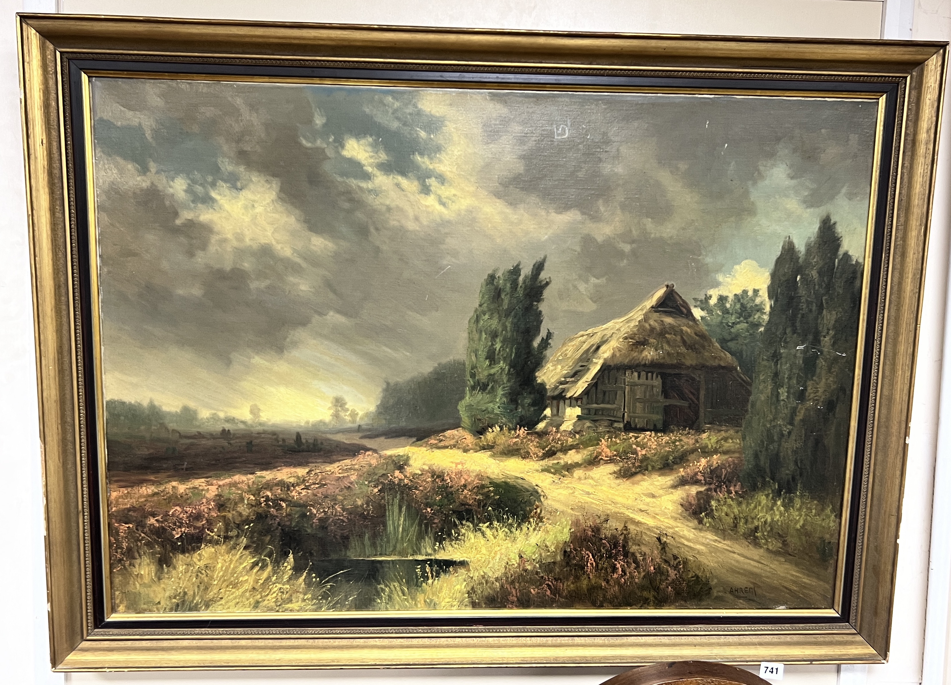 Ahrens (Canadian School), oil on canvas, Landscape with thatched barn, signed, 70 x 100cm